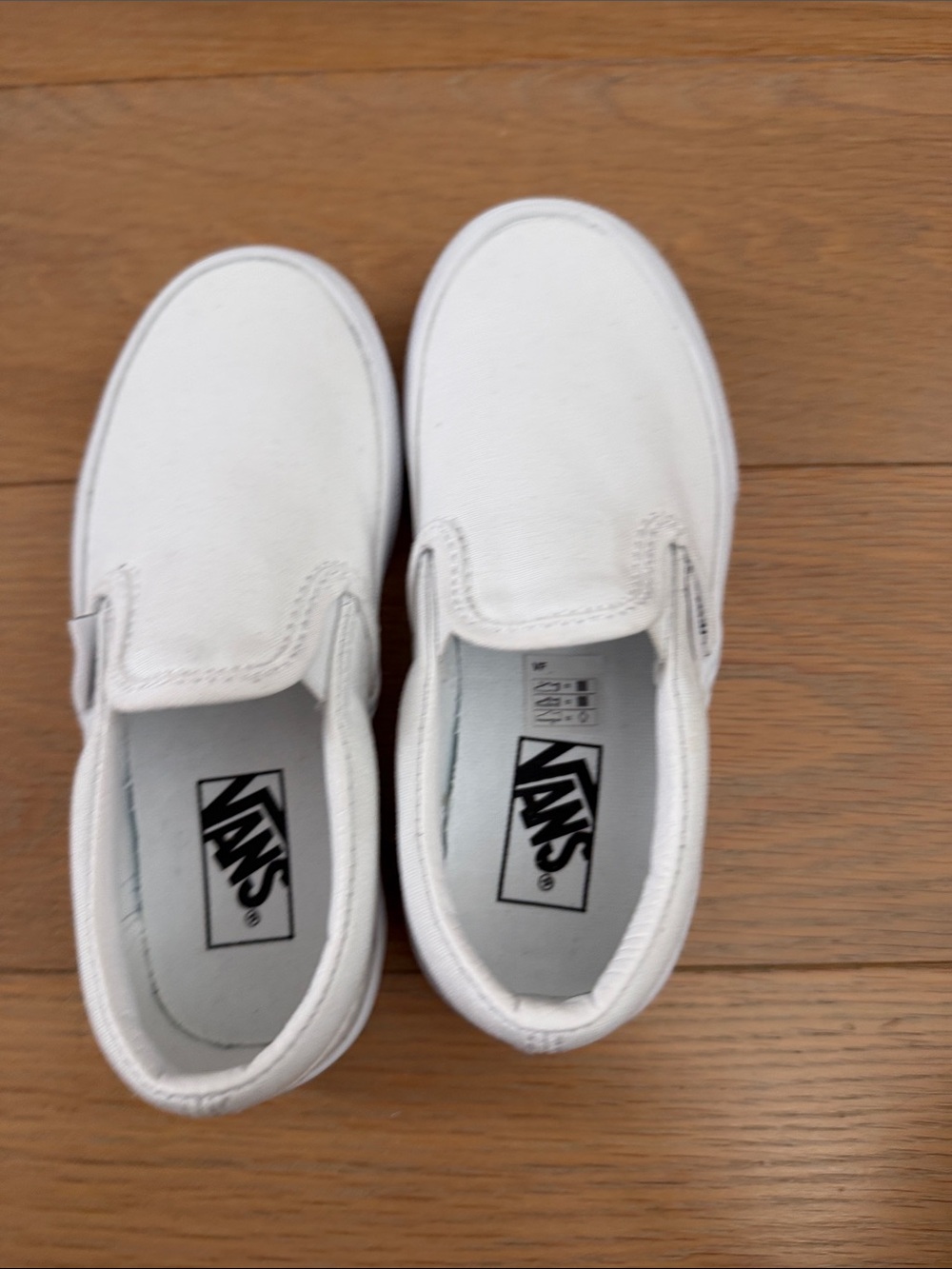 Vans Kids White Slip-On Canvas Sneakers